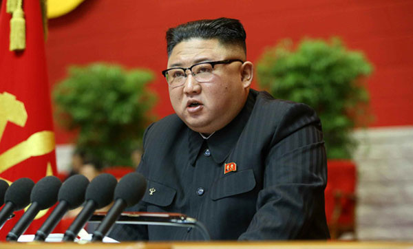 김정은 북한 국무위원장이 지난 5일 개막된 노동당 제8차 대회에서 사업총화 보고를 하고 있다 / ⓒ뉴시스-노동신문